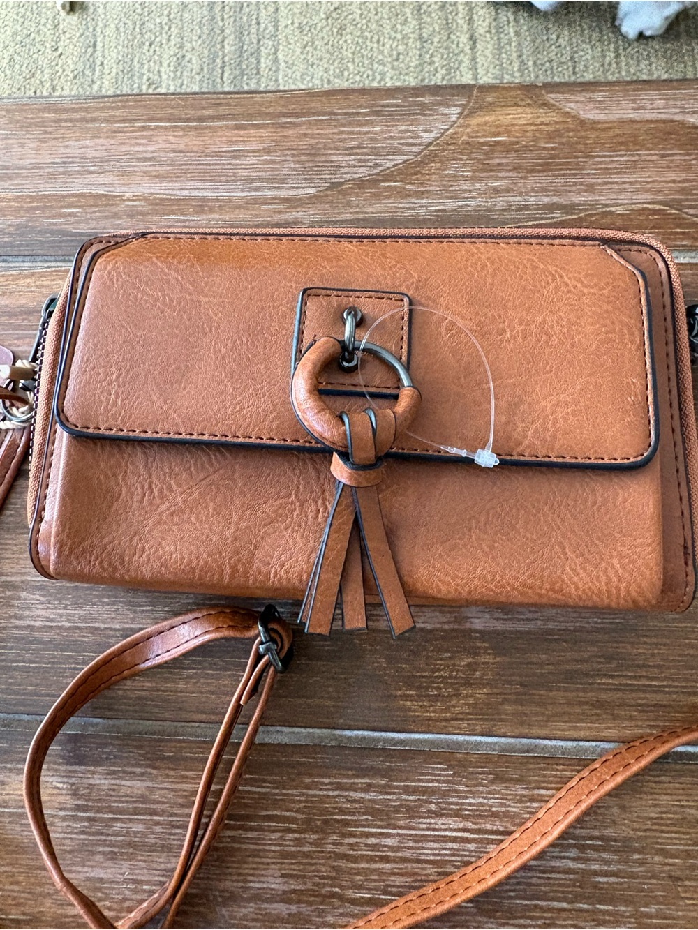 Crafted Tan Leather Crossbody with Ring Tassel Accent